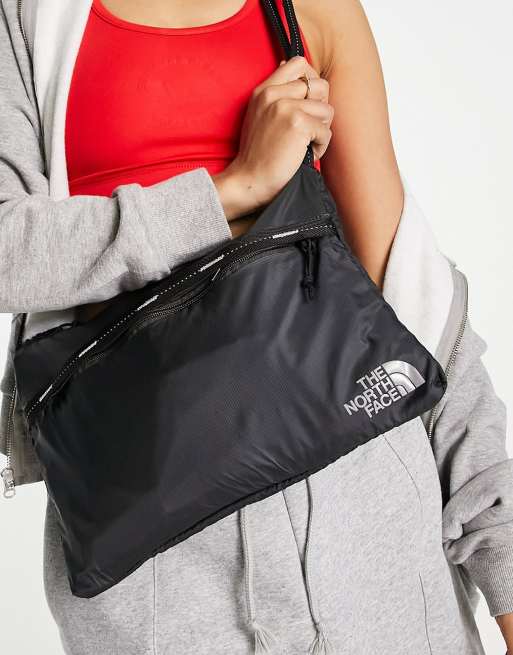 The North Face Flyweight shoulder bag in black ASOS