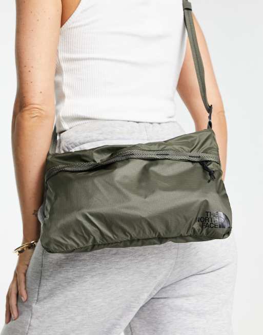 The North Face Flyweight shoulder bag in green ASOS