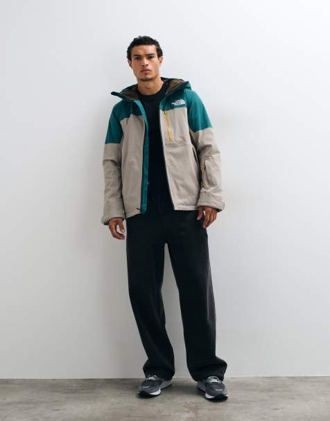 The North Face Freedom insulated jacket in stone white and teal blue - view 1
