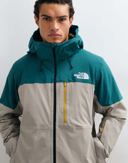 The North Face Freedom insulated jacket in stone white and teal blue, 2 of 5