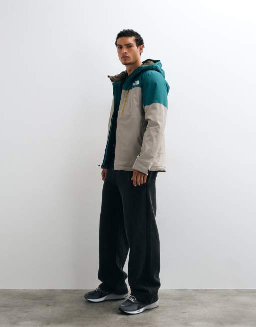The North Face Freedom insulated jacket in stone white and teal blue, 4 of 5
