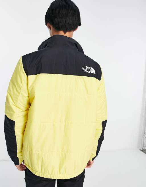 Doudoune the north face noir et jaune hot sale