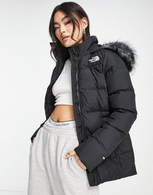 The North Face Gotham hooded down jacket with faux fur hood in black | ASOS