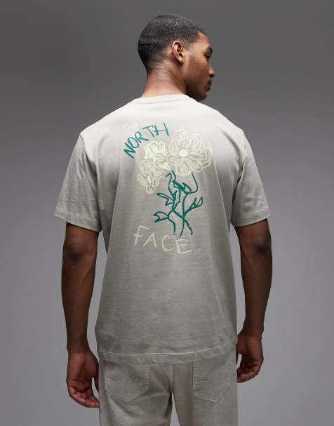 The North Face – Grå t-shirt med blomtryck baktill - view 1