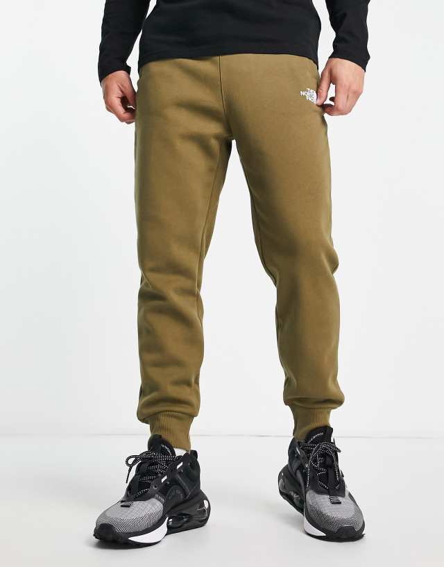 The North Face Graphic joggers in green