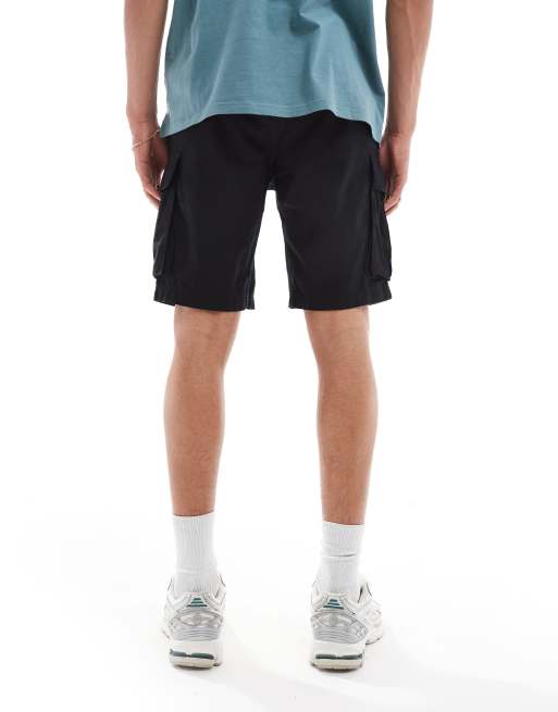 The North Face Heritage Anticline cargo shorts in black ASOS