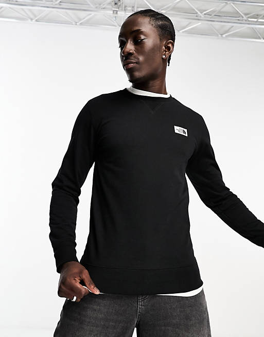 The North Face Heritage logo patch sweatshirt in black | ASOS
