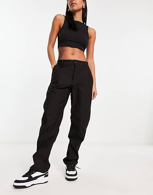 The North Face Heritage loose fit woven trousers in black | ASOS