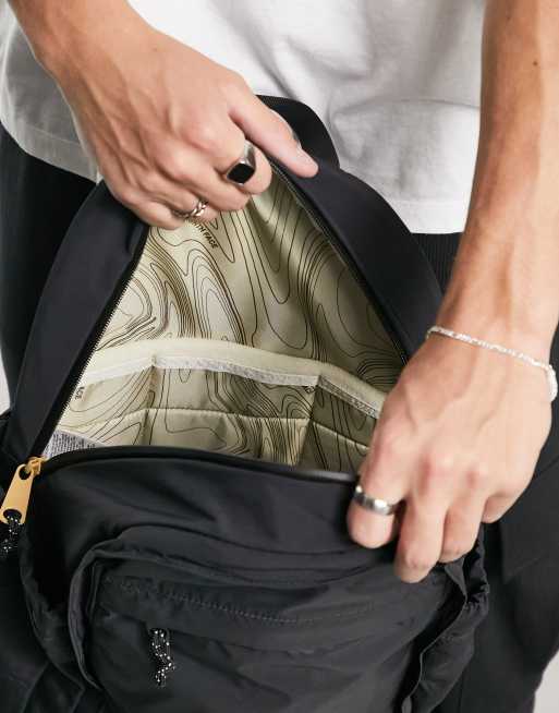 The North Face Heritage Mountain backpack in black ASOS