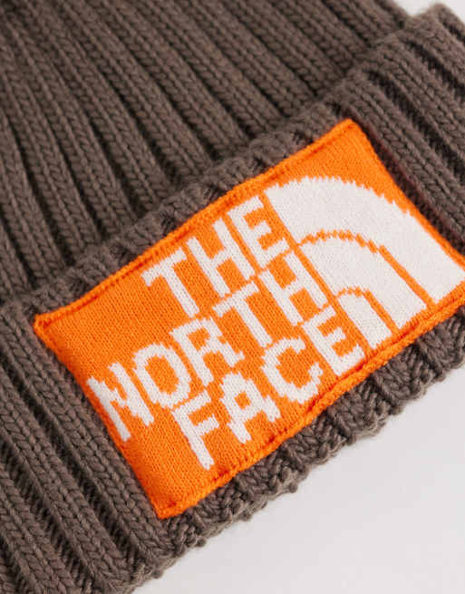 The North Face Heritage mutsen met pompon in bruin en oranje, 2 van 3