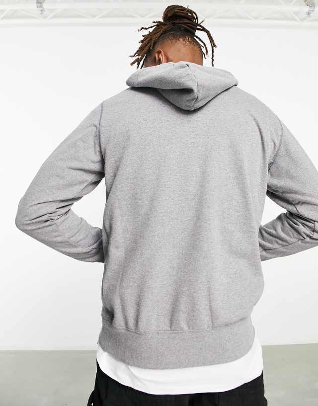 The North Face Heritage patch chest logo hoodie in gray 1