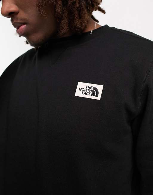 The North Face Heritage patch chest logo sweatshirt in black ASOS