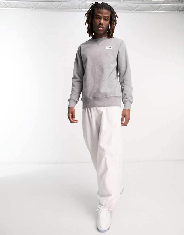 The North Face Heritage patch chest logo sweatshirt in gray 2
