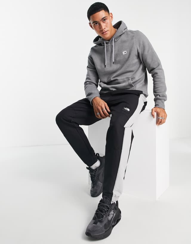 The North Face Heritage Patch logo hoodie in gray 1