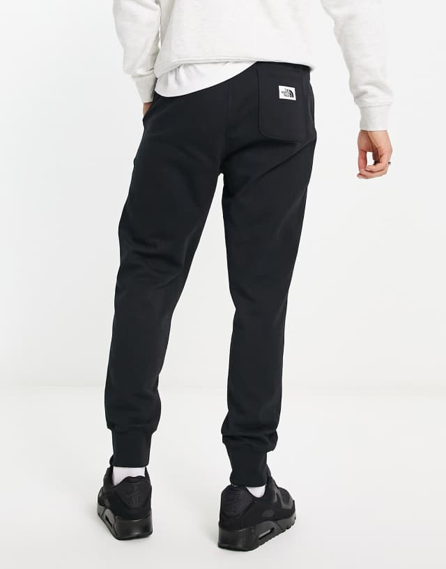 The North Face Heritage Patch sweatpants in black
