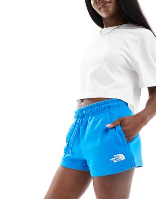 The North Face high waist jersey shorts in blue Exclusive at ASOS