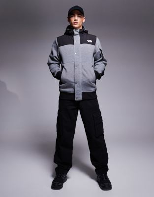Утепленная флисовая куртка с капюшоном The North Face Highrail серо-черного цвета