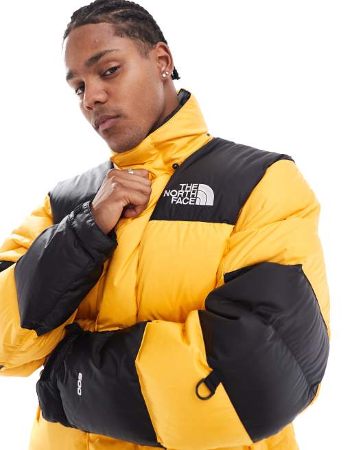 The North Face himalayan baltoro puffer jacket in black and yellow ASOS