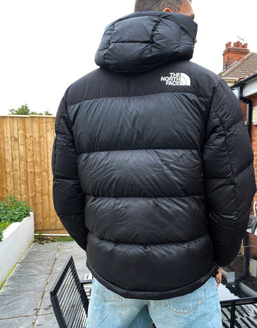 The North Face Himalayan Down hooded puffer jacket in black