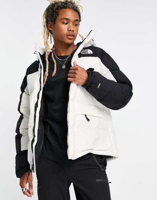 North face white hot sale and black puffer jacket