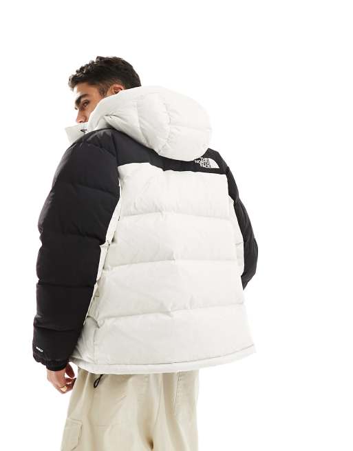 North face black store and white coat