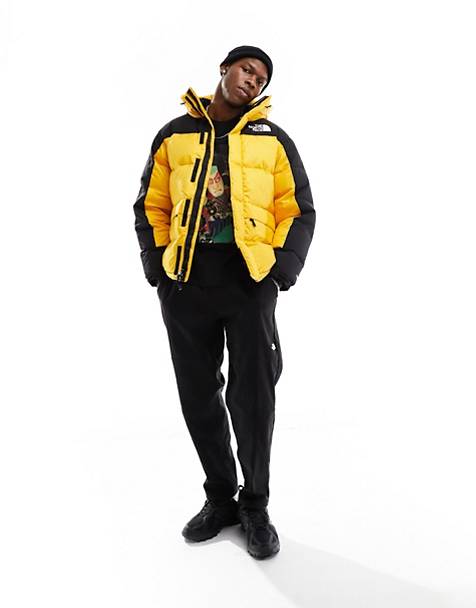 The North Face Himalayan down puffer parka coat in yellow and black