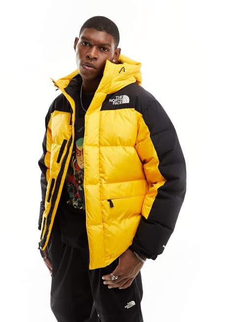 Yellow and black store north face puffer