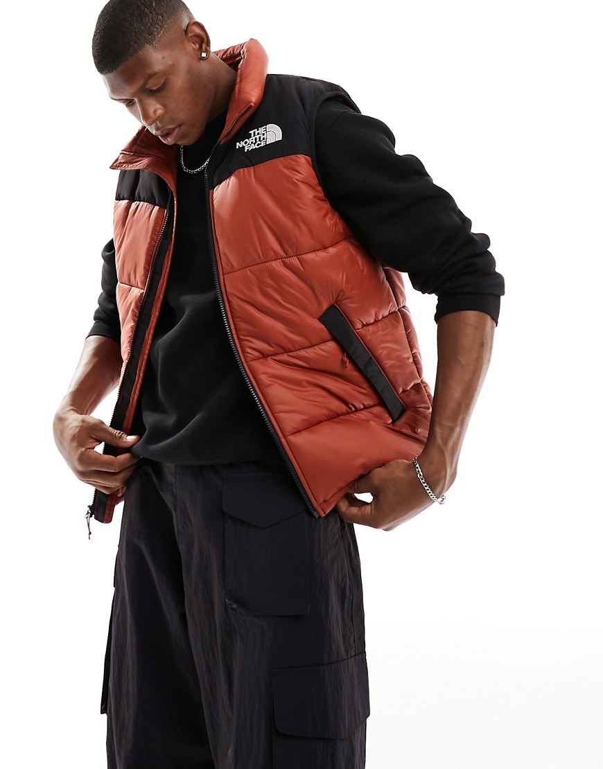 The North Face Himalayan Insulated puffer gilet in brown and black