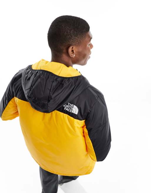 Yellow north face puffer on sale coat