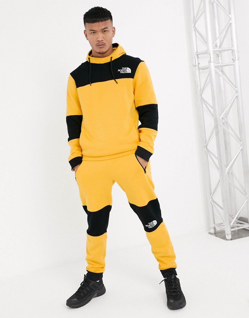 The North Face Himalayan pant in yellow/black