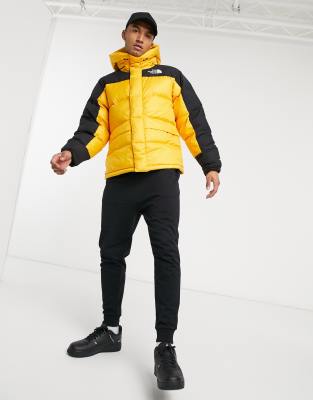 north face black and yellow puffer jacket