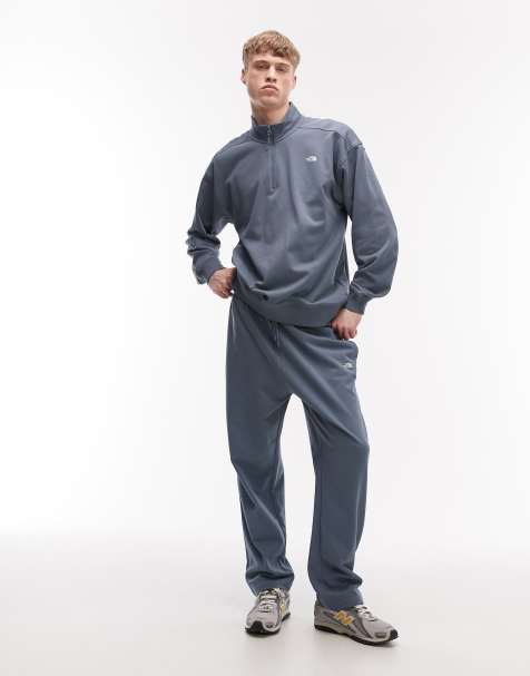 The North Face – Jasnoszare lekkie spodnie basic oversize z logo - view 1