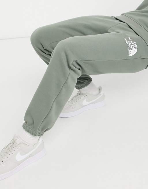 The north face online split dome track pants