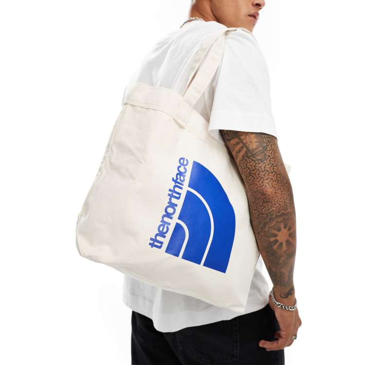 The North Face large half dome logo cotton tote bag in off white ASOS