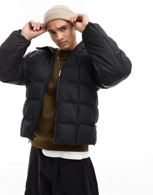 The North Face Lhotse reversible puffer jacket in black