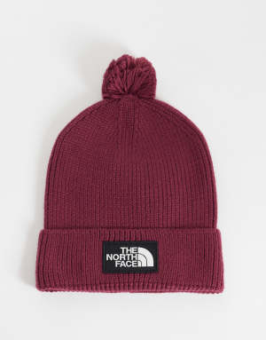 The North Face Logo Box pom beanie in burgundy