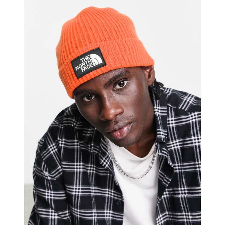 The North Face Logo Cuffed beanie in orange