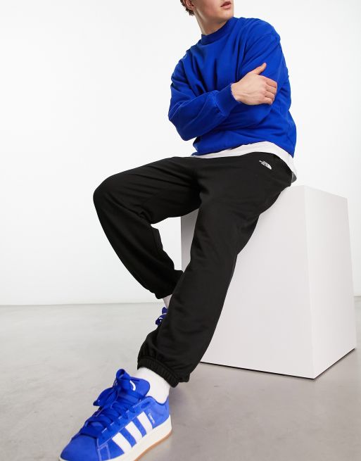 The North Face logo fleece baggy sweatpants in black, 3 of 4