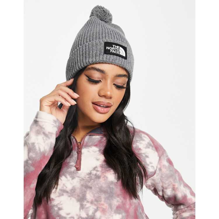 The North Face logo patch bobble hat in grey ASOS