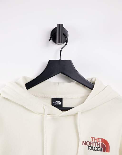 The North Face Logo Play hoodie in cream | ASOS