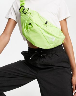 The North Face Lumbnical bum bag in lime green