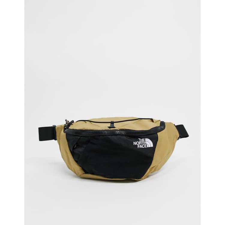 The North Face Lumbnical small fanny pack in brown ASOS