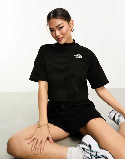 The North Face – Mhysa – Czarna krótka bluza dresowa z golfem z polaru o waflowej strukturze
