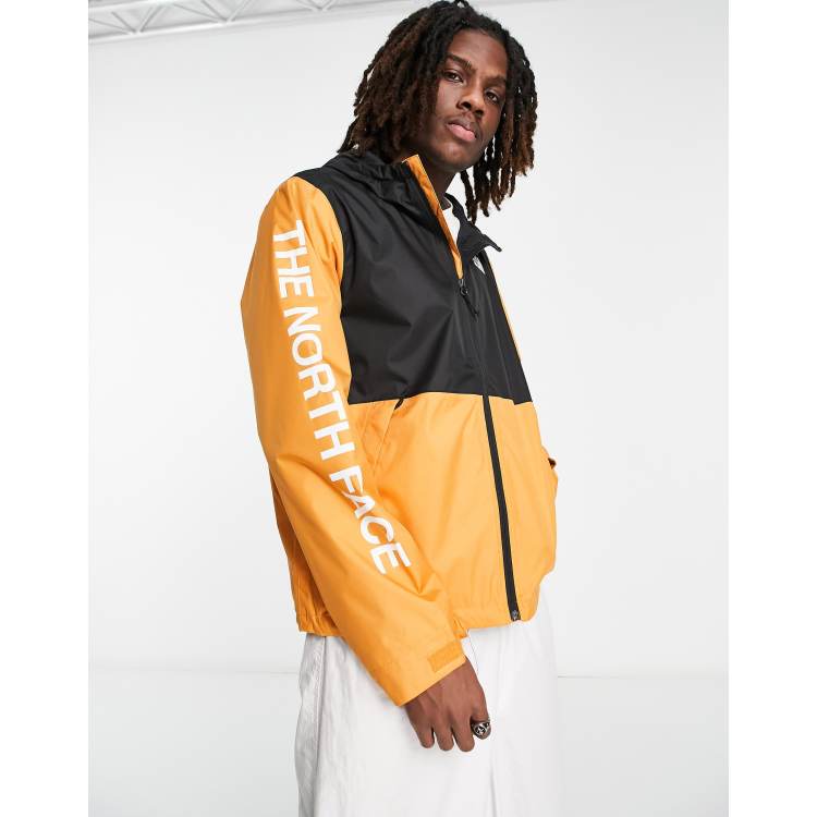 North face orange windbreaker best sale