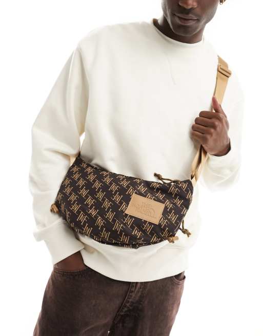 The North Face Monogram shoulder bag in brown | ASOS