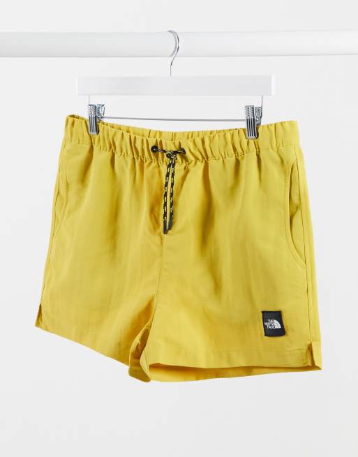 Yellow north store face shorts