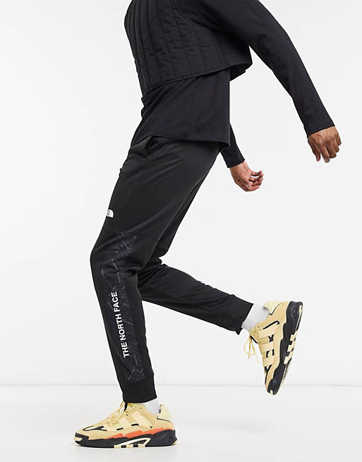 The North Face Mountain Athletic cuffed trackies in black
