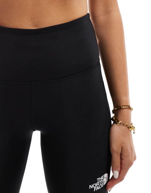 The North Face Mountain Athletics logo leggings in black | ASOS