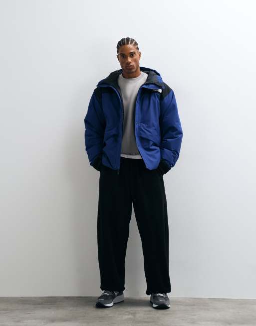 The North Face Mountain Down jacket in blue and black, 3 of 5