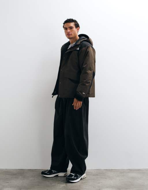 The North Face Mountain Down jacket in brown and black, 3 of 5